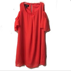 Soft, flowing, sleeveless, cold shoulder